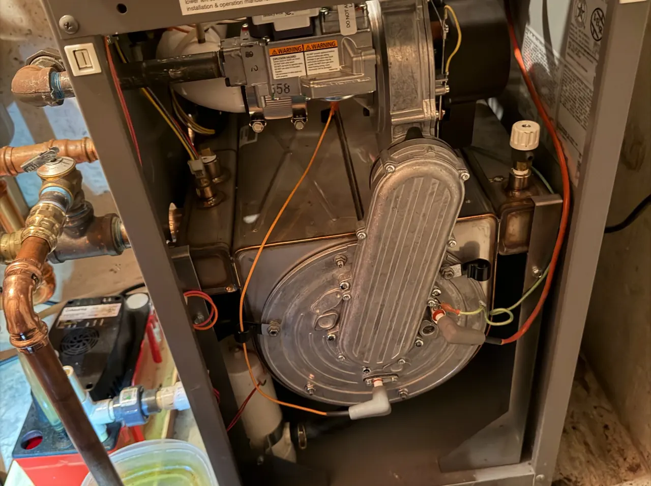 Boiler with the front cover off during a service visit