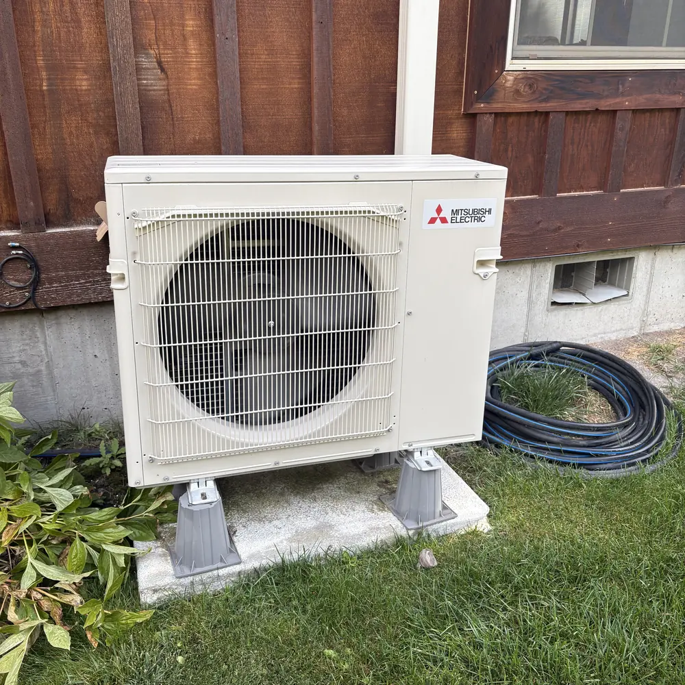 Outdoor heat pump unit at a Flathead Valley home